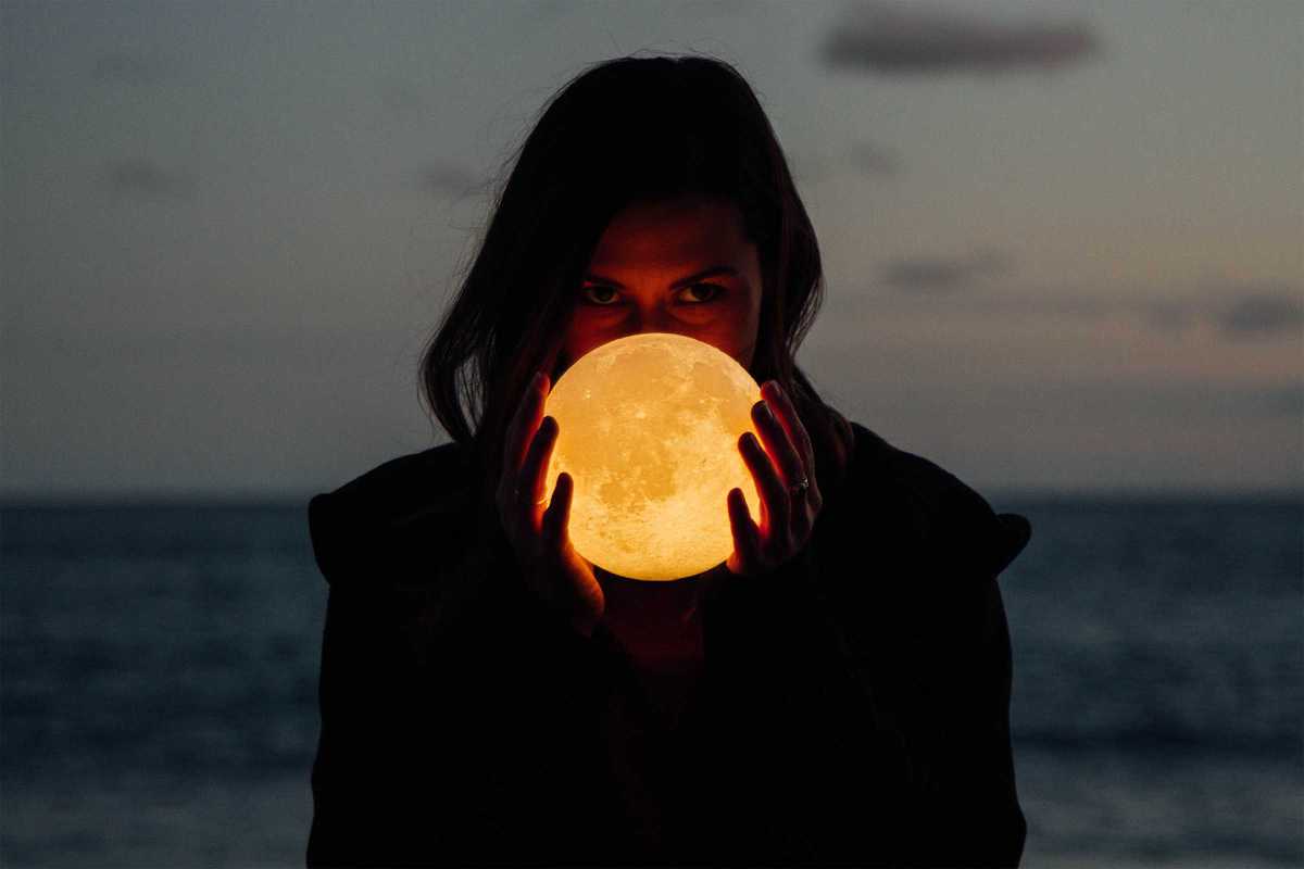 woman-holding-moon