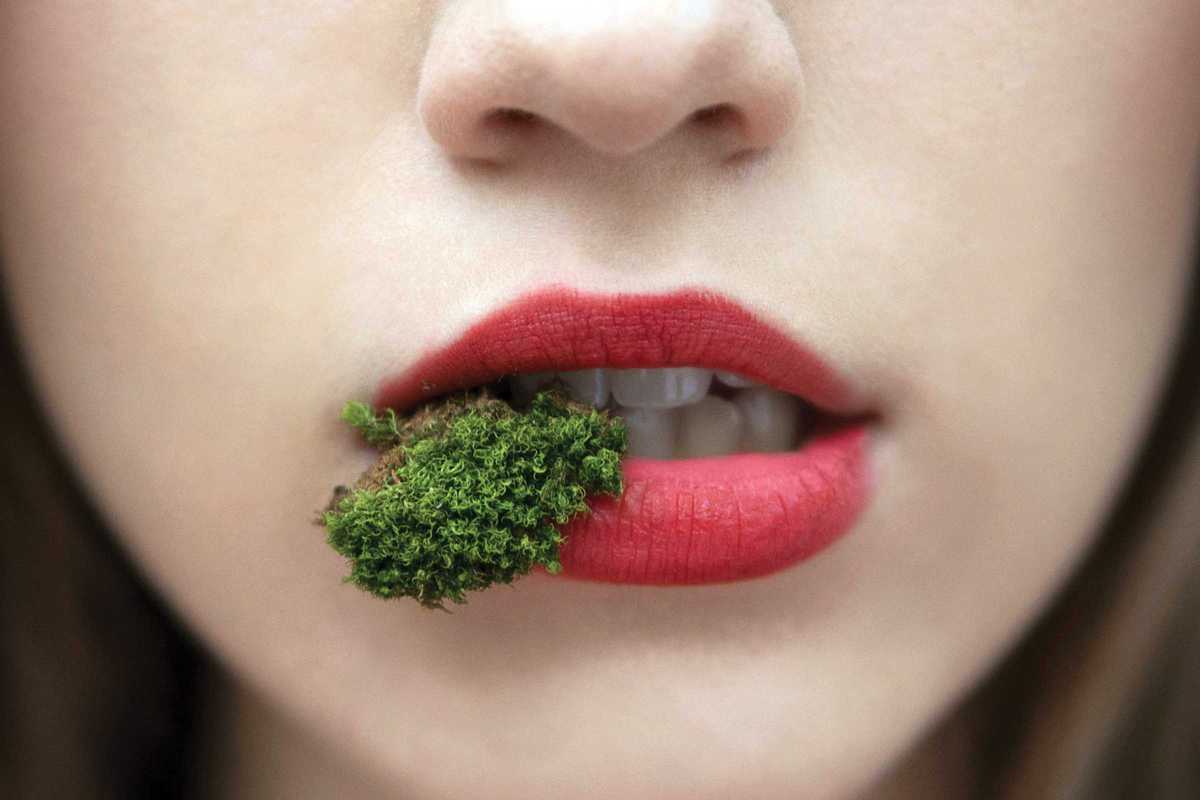 womans-face-eating-parsley